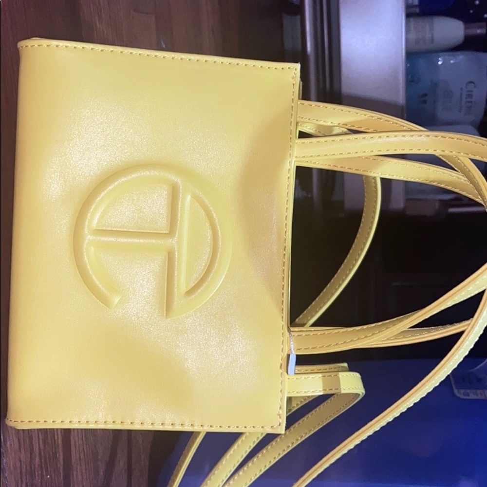 Small yellow telfar bag